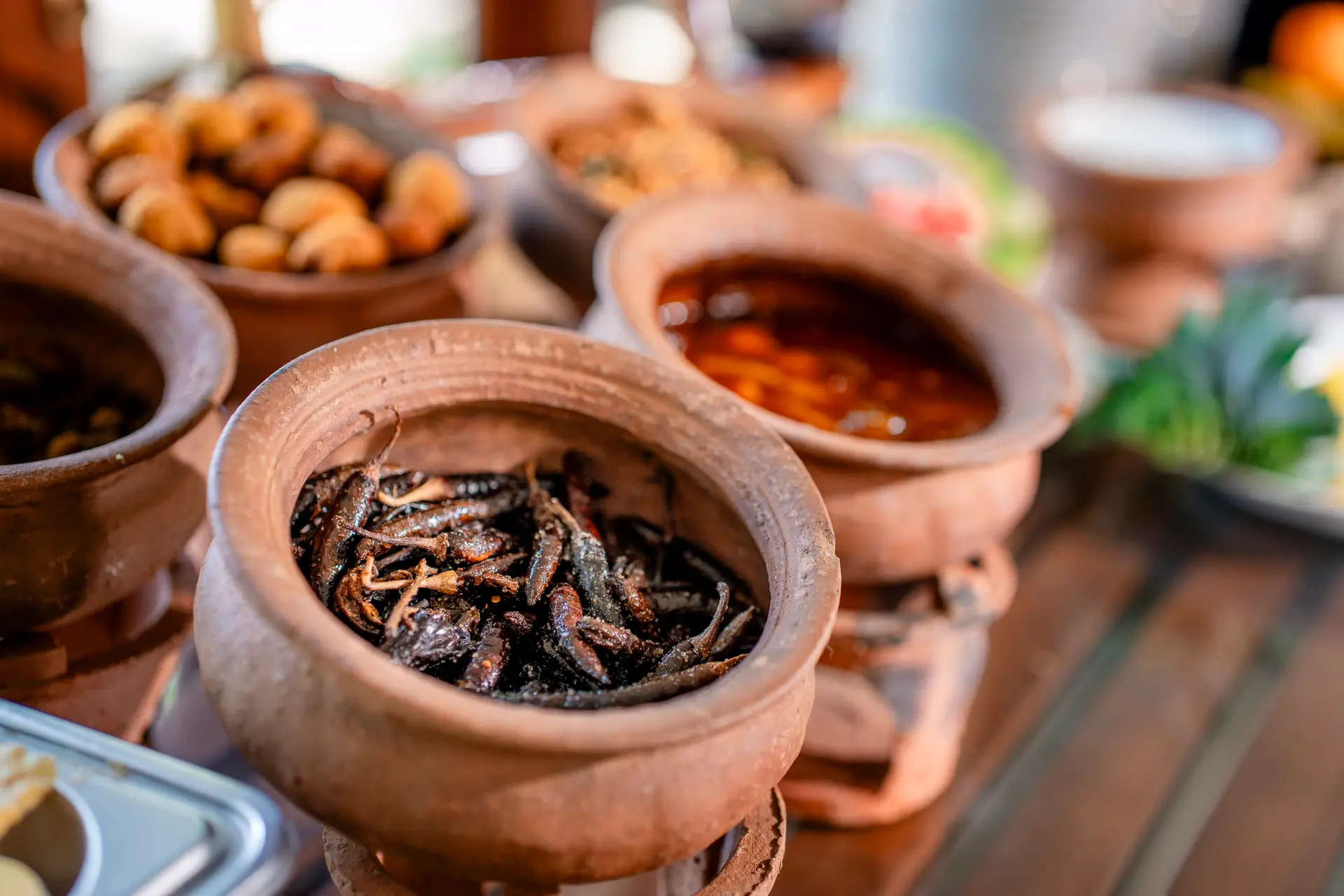 Crispy fried fish in a clay pot
