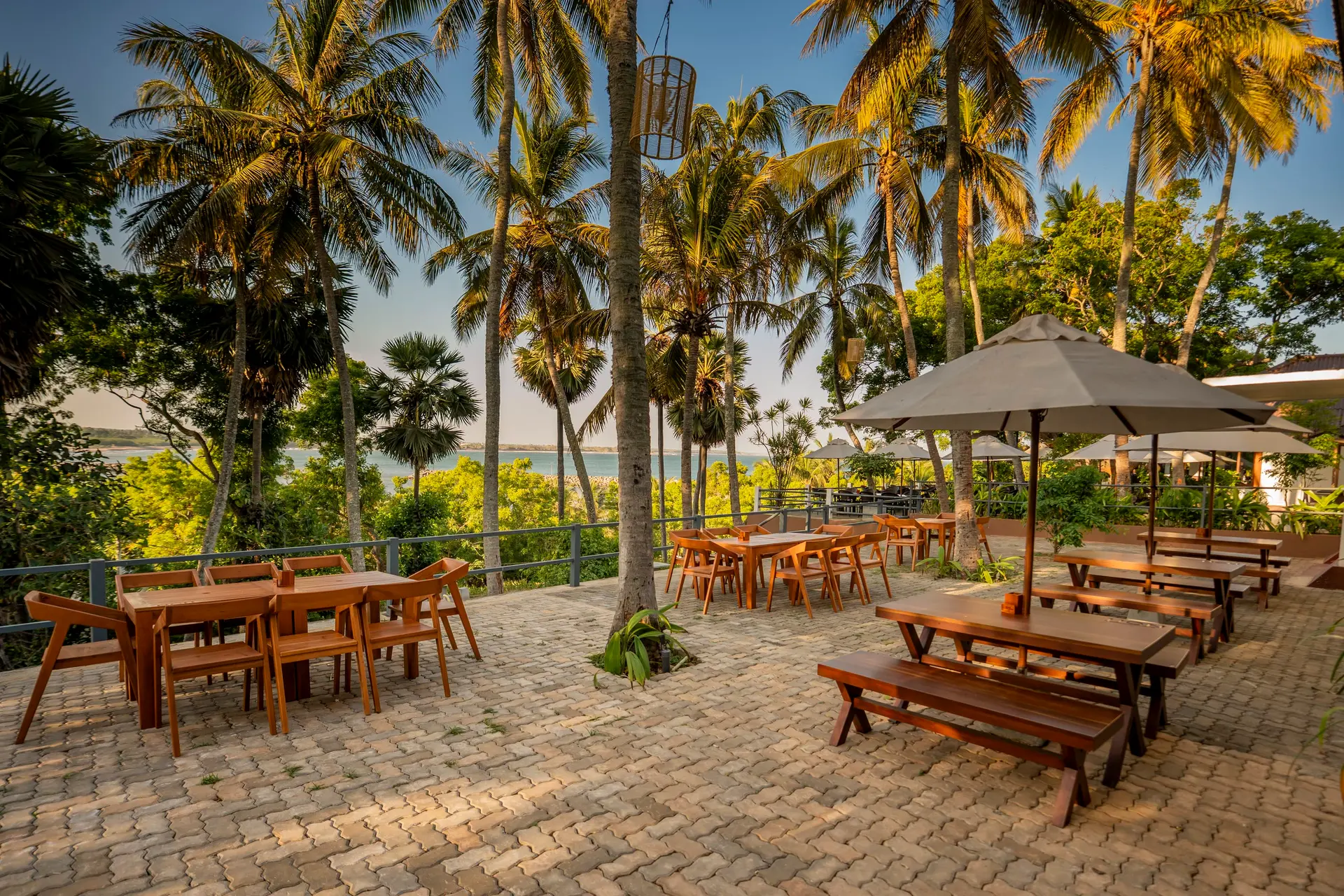 Terrace tables among the palms